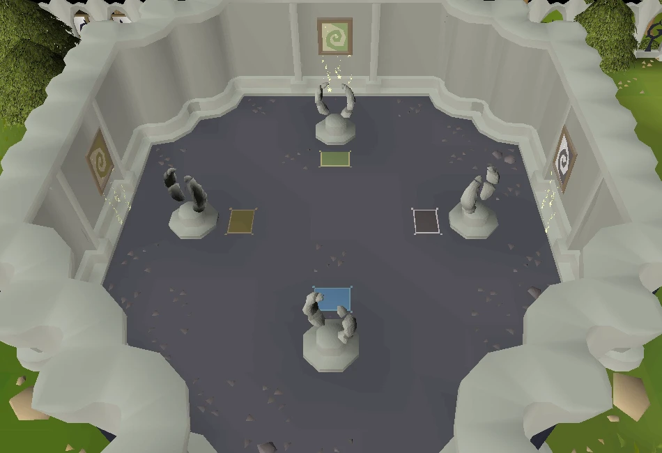 The Mage Training Arena lobby seen from above, with four guardian statues and coloured floor mats in front of the room portals